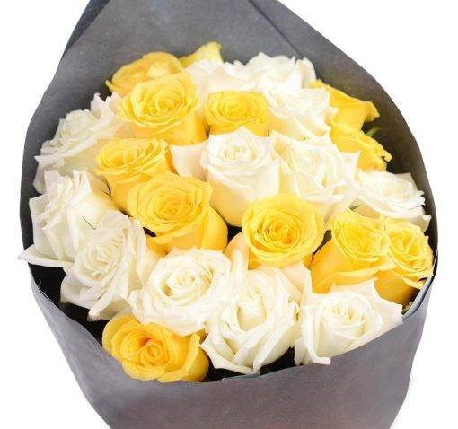 bunch of yellow white roses