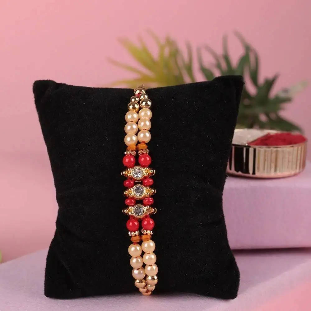 Beads Rakhi with Pineapple Cake Combo